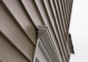 vinyl siding near window on side of house